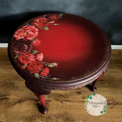 Oak coffee table with roses on deep red paint blend