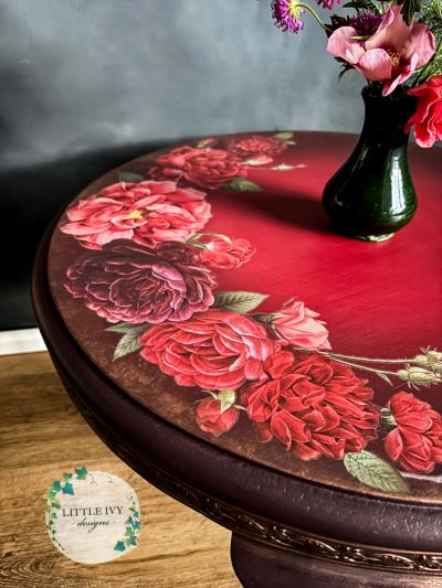 Oak coffee table with roses on deep red paint blend