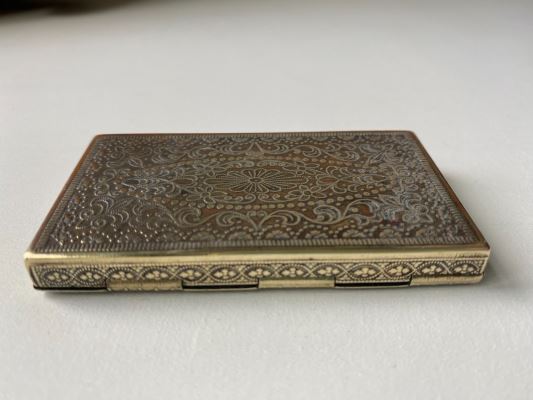 Anglo-Indian cigarette box with intricate raised design 