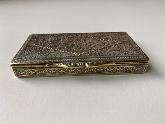 Anglo-Indian cigarette box with intricate raised design 