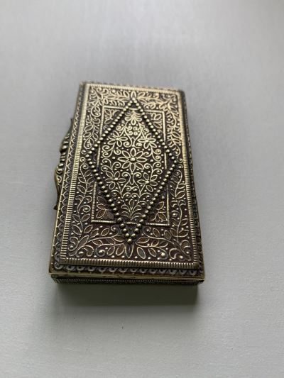 Anglo-Indian cigarette box with intricate raised design 