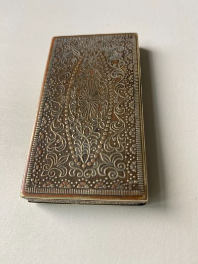 Anglo-Indian cigarette box with intricate raised design 