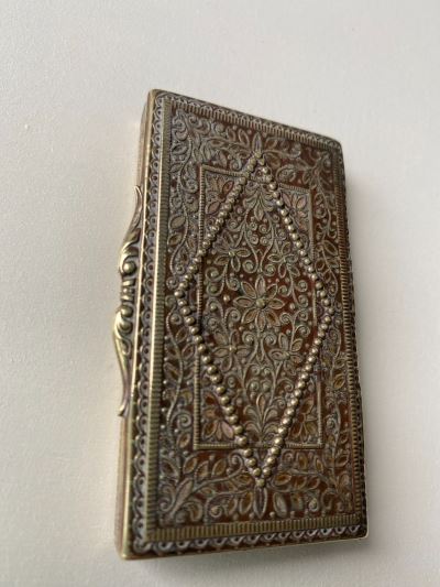 Anglo-Indian cigarette box with intricate raised design 